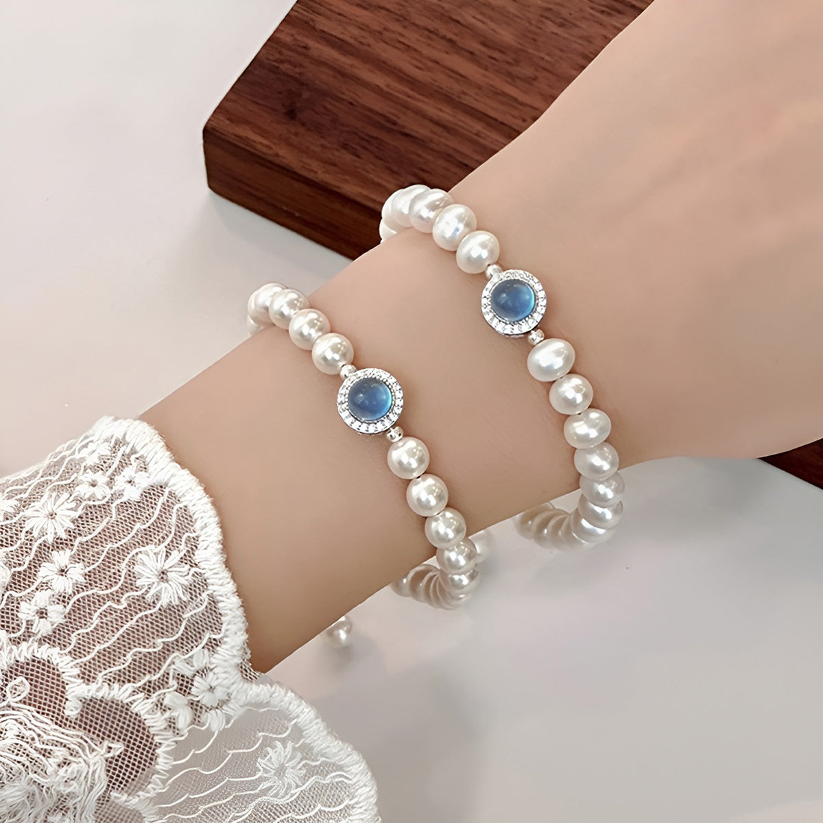 Pearl Bracelet with Blue Gemstone Accent
