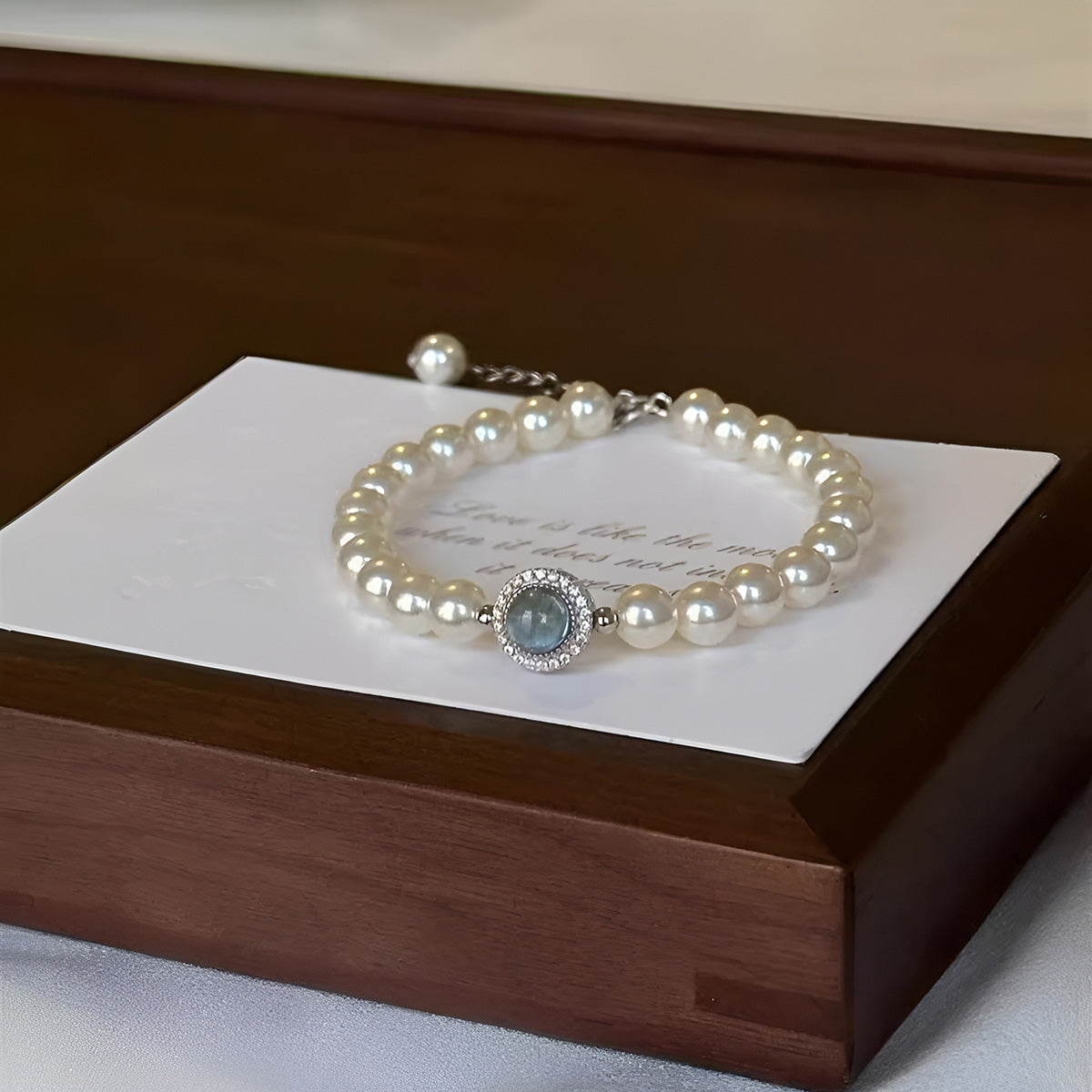 Pearl Bracelet with Blue Gemstone Accent