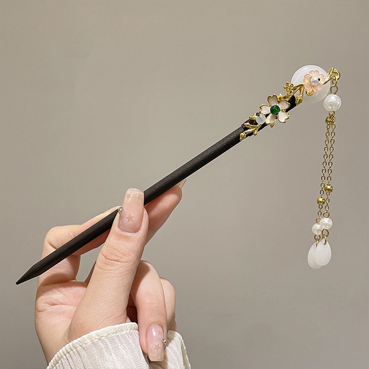 Elegant floral wedding hair accessory with beads and charms