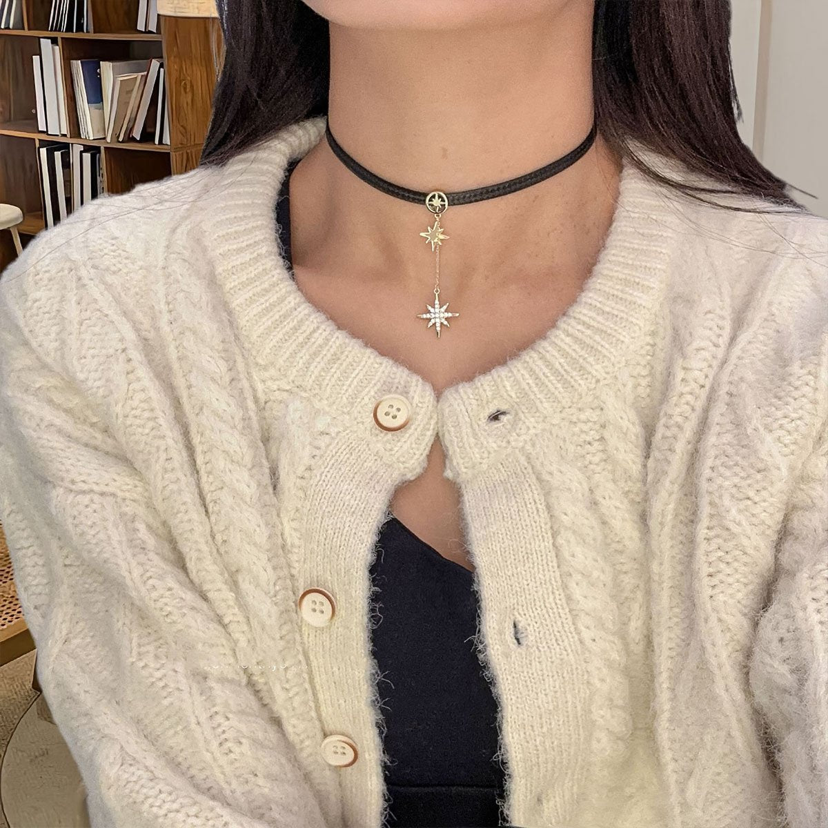 Black leather choker with star pendant
