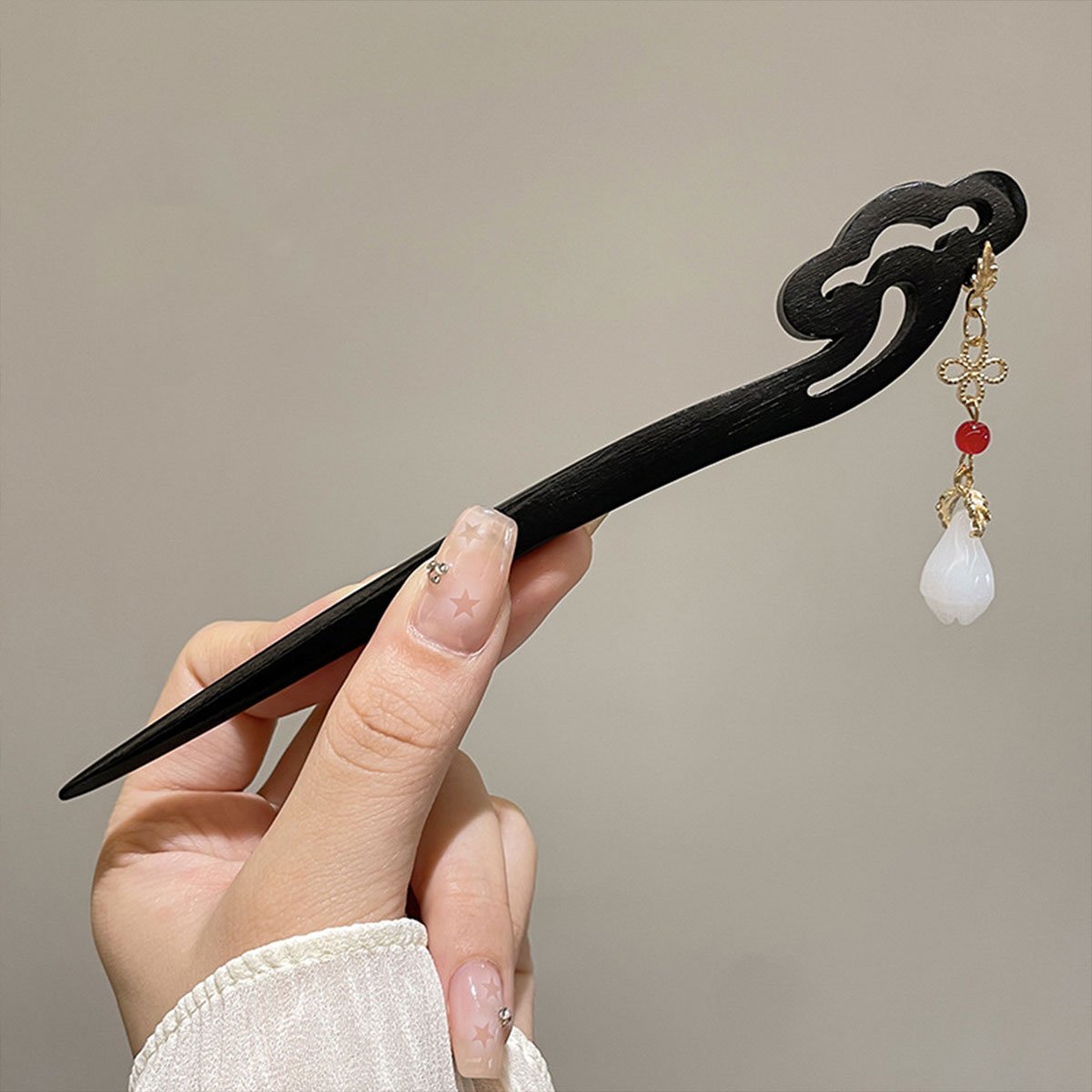 Elegant vintage hairpin with beads and intricate design